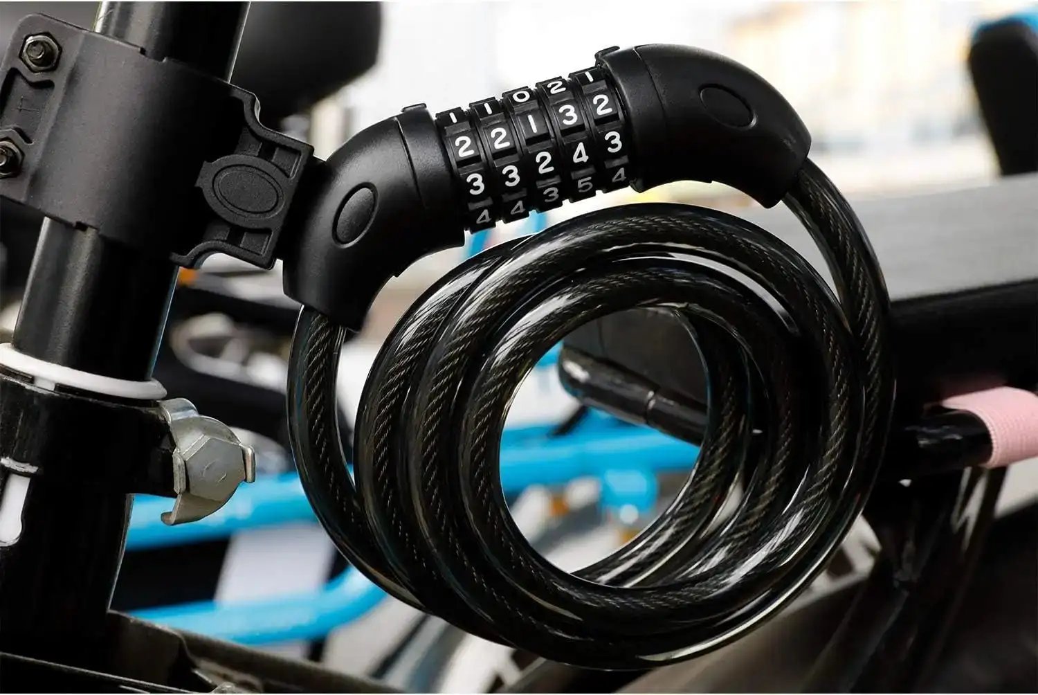 Bike cable lock mounted on a bicycle frame with bracket