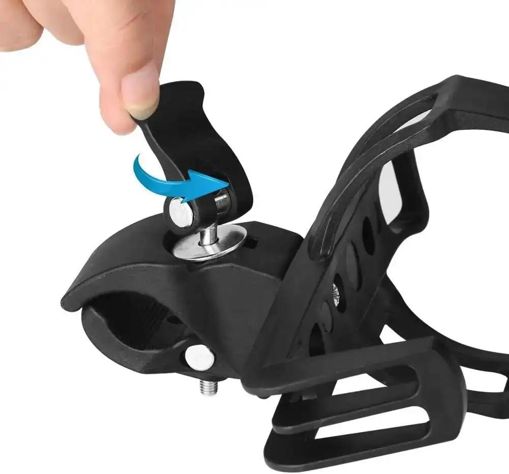 Bike bottle holder clamped onto handlebar showing quick-release mount
